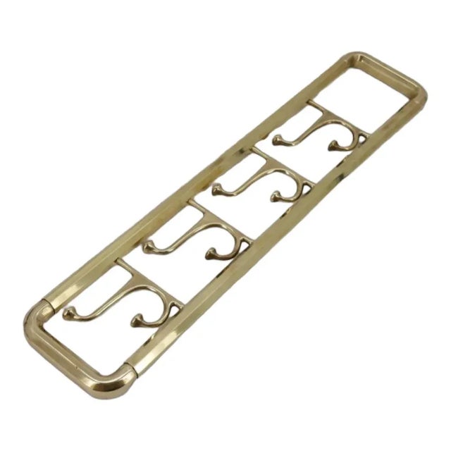 • Vintage design • Wall of four rotating hooks; with beautiful gold and octagonal structure. • Design era from 1920 to...