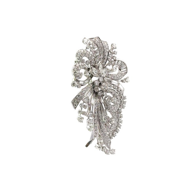 A lovely treasure from the middle of the 1900’s features approximately 21.40 carats of mixed-cut white diamonds. The...