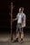 1890s; The Udell Works Company - Indianapolis, IN Patent-stamped oak and cast iron coat stand with pierced scrollwork arms...
