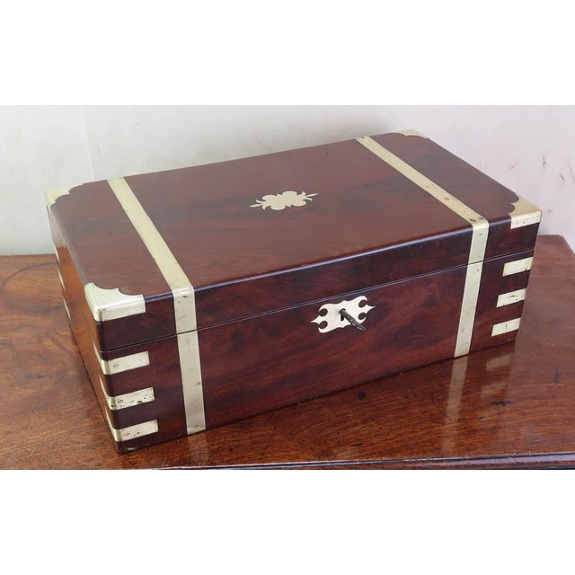 Wonderful solid tropical hardwood writing box or slope Fabulous colour and figure in the wood Fine brass hardware with...