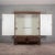 This imposing cabinet with doors, dating back to the 19th century, embodies the austere charm and solidity typical of...