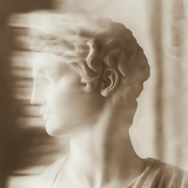 Blurred Antique Profiles is a carefully curated set of 18 restored antique sepia photographs, presented as a unified...