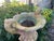 This product is a pair of large stone garden urns standing at 52 inches tall, each adorned with a pedestal. The urns...