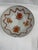 The bowl is decorated in a classical style featuring an intricate diaper-pattern border along the upper rim. The main...
