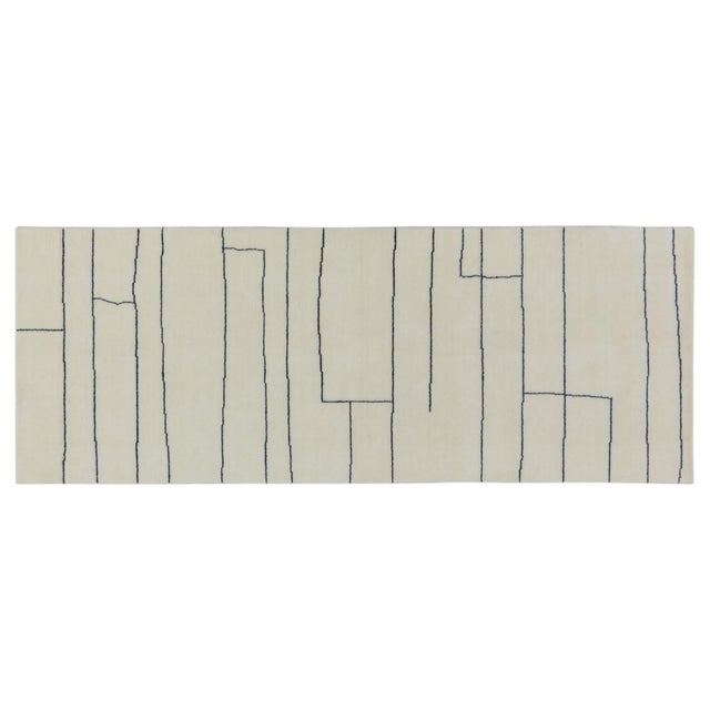 Hand-knotted with care using traditional rug-making techniques, this wool rug blends timeless craftsmanship with a modern...