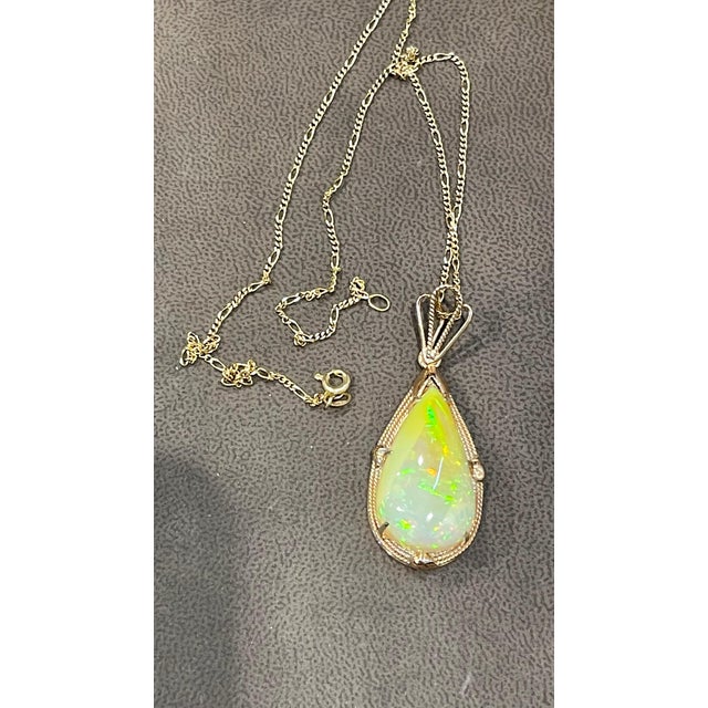 18 Carat Pear Ethiopian Opal Pendant / Necklace 14 Karat Yellow Gold Estate For Sale - Image 13 of 18