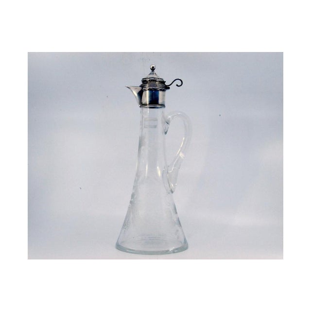 Glass Jug with Reliefs on the Neck and Silver Hinged Lid, in Good conditions.