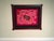 Framed vintage Mola appliqué textile fiber arts from the tradition of Panama, Central America. Art depicts bird.