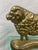 These antique doorstops were usually English or Scottish.. This guy is solid brass and most seem to be iron. His anatomy...