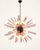 Italian Sputnik chandelier with 50 trihedral prisms in pink glass. The elements radiate from a black metal core, forming a...