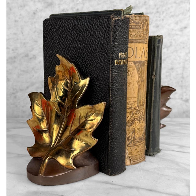 - Original 1970's Cast Metal Maple Leaf Library Bookends - Made by Philadelphia Mfg Company - Gold Lacquered Gilded Finish...