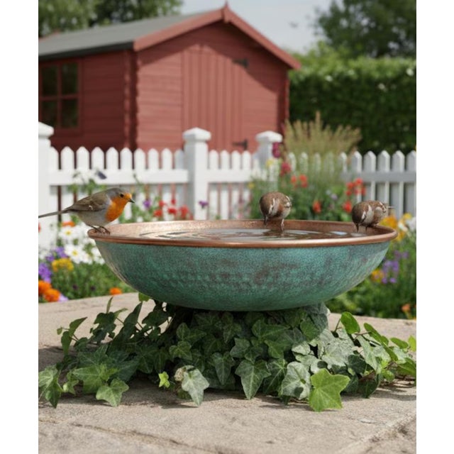Bring timeless craftsmanship and natural warmth to your space with this handmade hammered copper bowl. Each piece is...