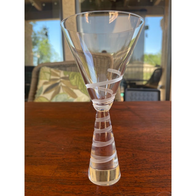 Here are a set of 2 Salviati "Eliche" Venetian crystal glasses. An iconic spiral design produced by the longstanding...