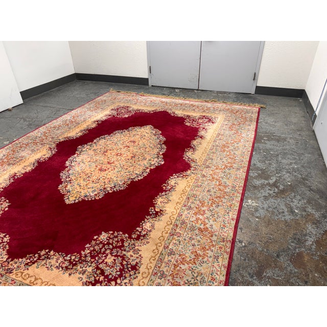 Design Plus Gallery presents a 8 Ft 7 in × 12 Ft 3 in Red Medallion Kirman Area Rug by Karastan. This Karastan area rug is...