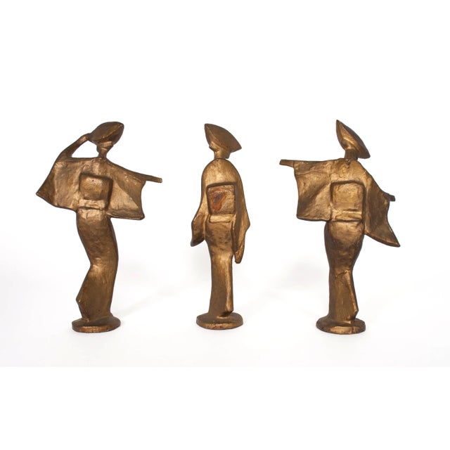 Wonderful set of 3 cast metal geishas with a gold finish. This trio is uncommonly large, with each figure measuring 9.25"...