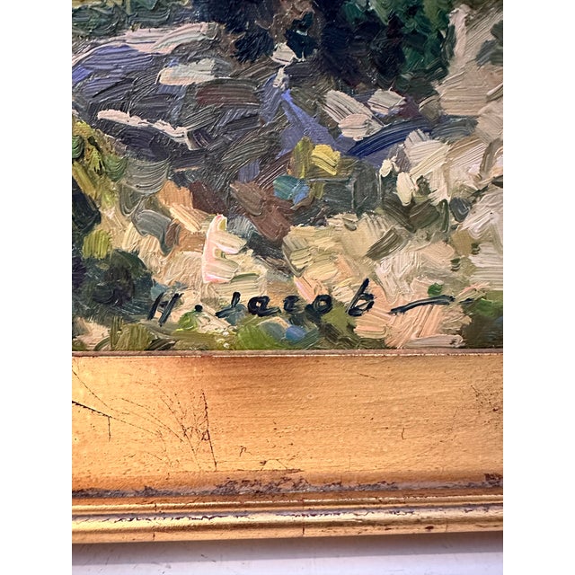 This oil painting by M. Jacobs captures a sweeping hillside view bathed in natural light. The artist’s impressionistic...