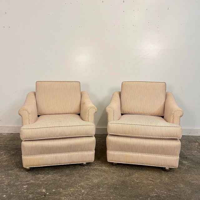 This is a petite pair of Dunbar style chairs on casters with a striped fabric. There is a traditional but modern feel to...