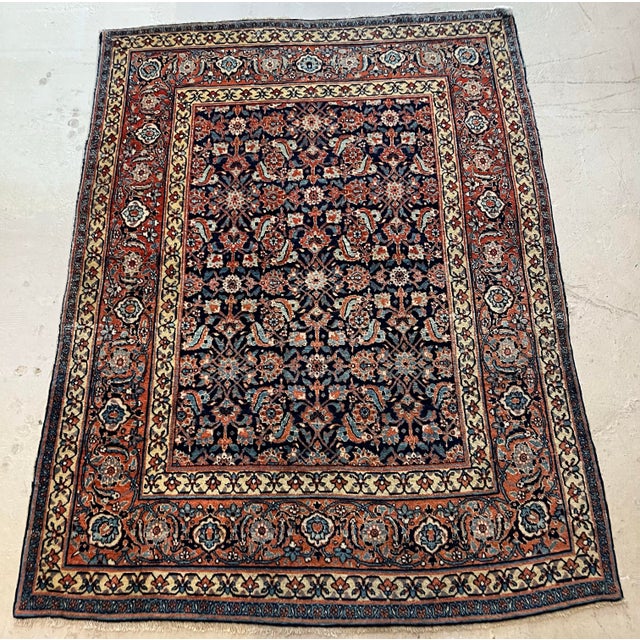 Circa 1900 Tabriz rug with all over design. Blue background and soft blue and ivory accent colors on a flower design with...