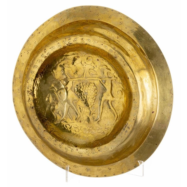 Alms Plate German Nuremberg, 16th century Made of yellow metal, embossed and engraved decoration with figures and vegetal...