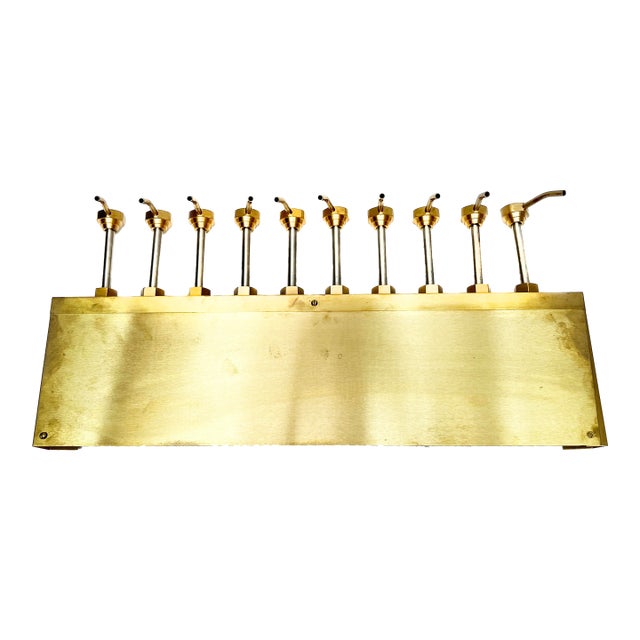 Large Vintage Solid Brass Metal Industrial Row of Syrup Pumps For Sale