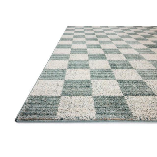 The Calvin Collection by Chris Loves Julia x Loloi is a geometric area rug with tile-inspired patterns for contemporary...