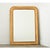 A lovely gilt mirror from 19th century France, the strong proportions of the Louis Philippe style arch-top frame are...