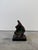 Abstract bronze sculpture on black granite base by unknown artist, Brazil 1960s.