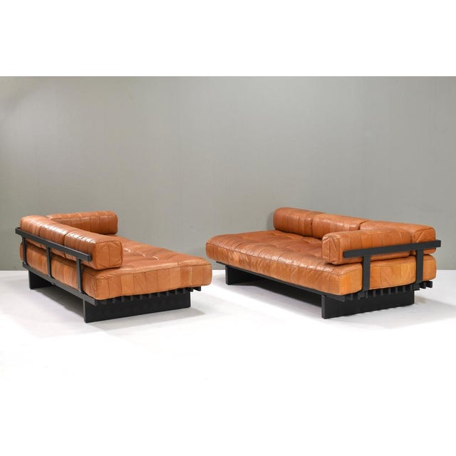 Introducing this gorgeous center piece cognac brown ds80 patchwork daybed sofas by de sede. The arm and back supports made...