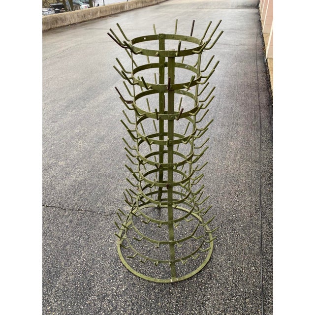 46” tall Antique Wine Bottle Rack, found at a Paris flea market. This is an exceptionally tall Wine bottle rack that looks...