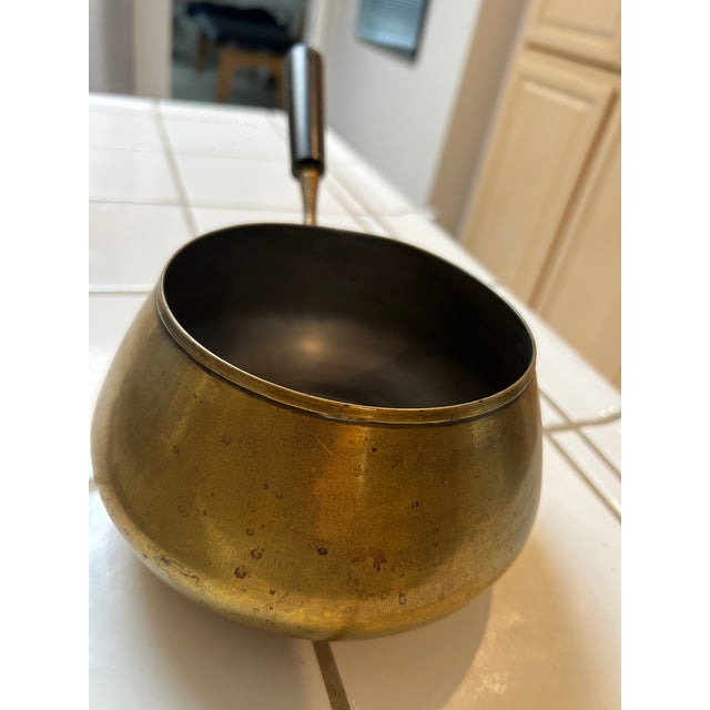 Mid Century Brass Saucepan or jam pan with long black handle. Origin unknown. In relative good shape with a soft patina...