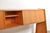 What a striking piece! this is, of course, due to the legs that angle forward and the entirely slanted front. The oak unit...