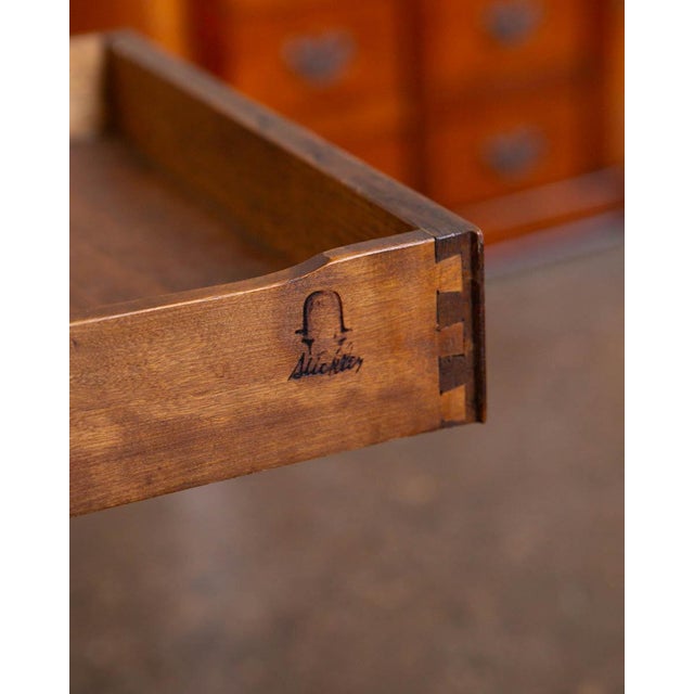 Early 20th century Gustav Stickley library table, executed in solid oak with the maker’s stamp to one drawer. The design...