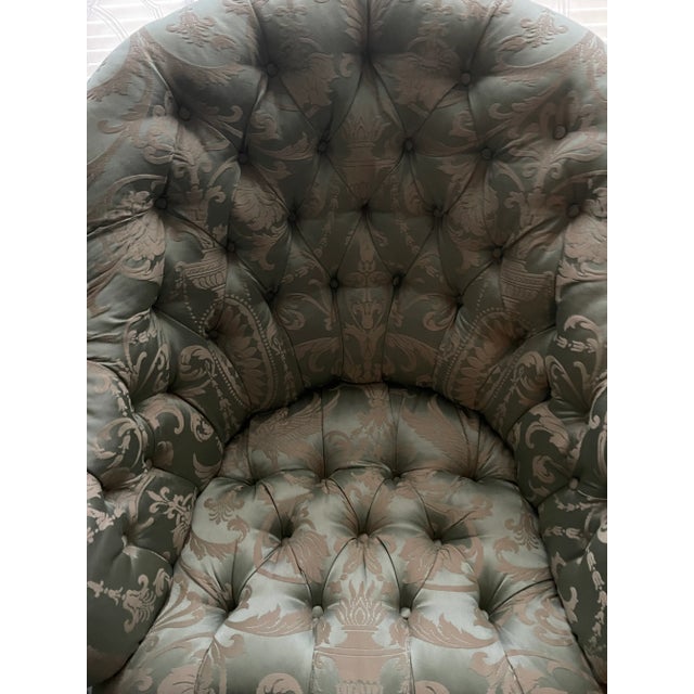 Beautiful antique French lounge chair with carved walnut frame. Upholstered in a Scalamandre mint green and beige silk...