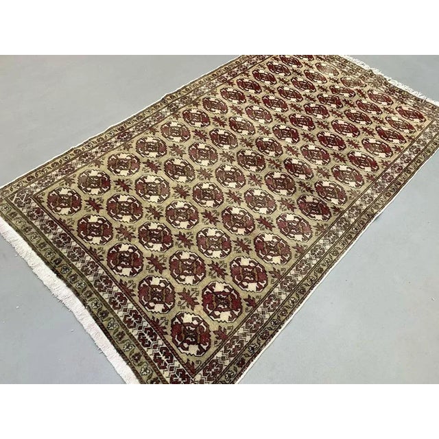 Beautifully woven hand knotted Turkish Kayseri Bunyan Rug from 1960s with an Turkoman Gul pattern. Knotted tightly on a...