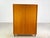 Beautiful teak cabinet from the 1960s from the renowned German manufacturer "WK Möbel". The furniture has three height-...