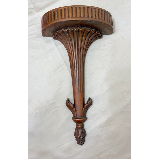 Up for sale is a wonderful antique 19th century Neoclassical bronze clad wall shelf. This wall-mounted shelf is done in an...