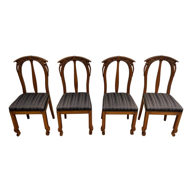 Early 20th Century Set of 4 cherry wood chairs decorated with flowers and plants. For Sale