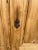 Antique Swedish pine armoire with carved accents and newer garment rod.
