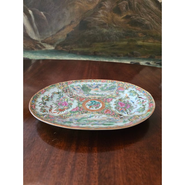 A good original antique chinese porcelain rose medallion mandarin canton oval platter . Absolutely an original handmade...