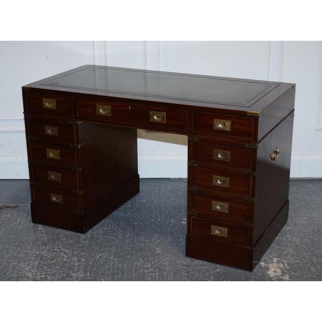 Discover timeless craftsmanship with this exquisite antique military campaign desk, a true statement piece for any study,...