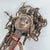 This figure has arms covered in leather and a has fabric skirt.The Nyamwezi people are an ethnic group that inhabits the...