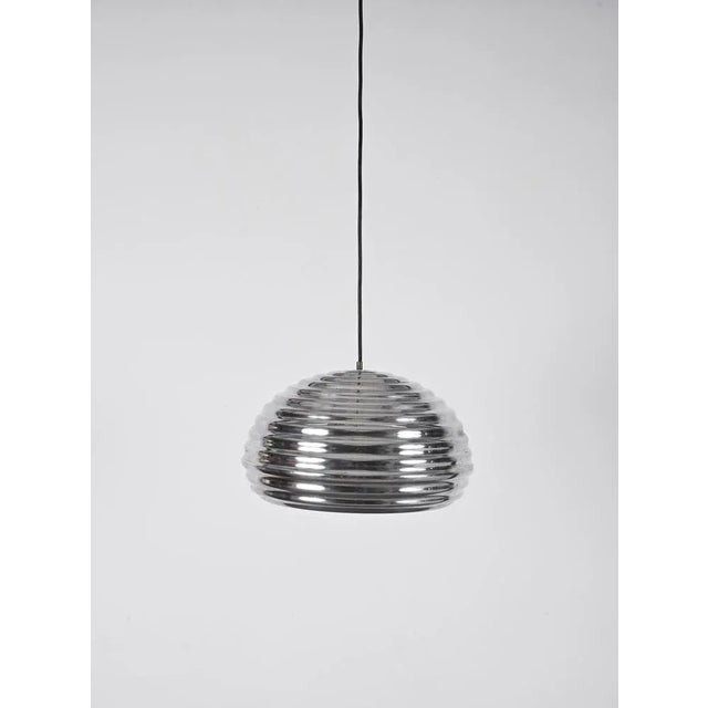 Gorgeous pendant lamp in aluminium designed by achille castiglioni and produced in the 1960s in italy. This stunning...