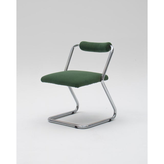 Tubular chairs made of chromed steel, upholstered in bottle green, in excellent condition.