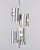 Found in Italy, this circa 1960s hanging pendant has two tiers of three staggered aluminum tubes with cut outs for the...