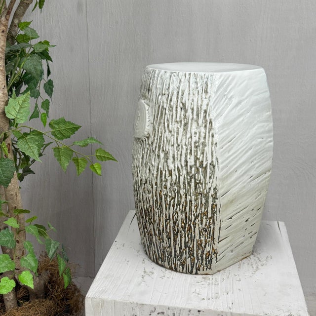 "About This Piece About This Piece Blending art and nature, this glazed ceramic stool brings the quiet poetry of the...