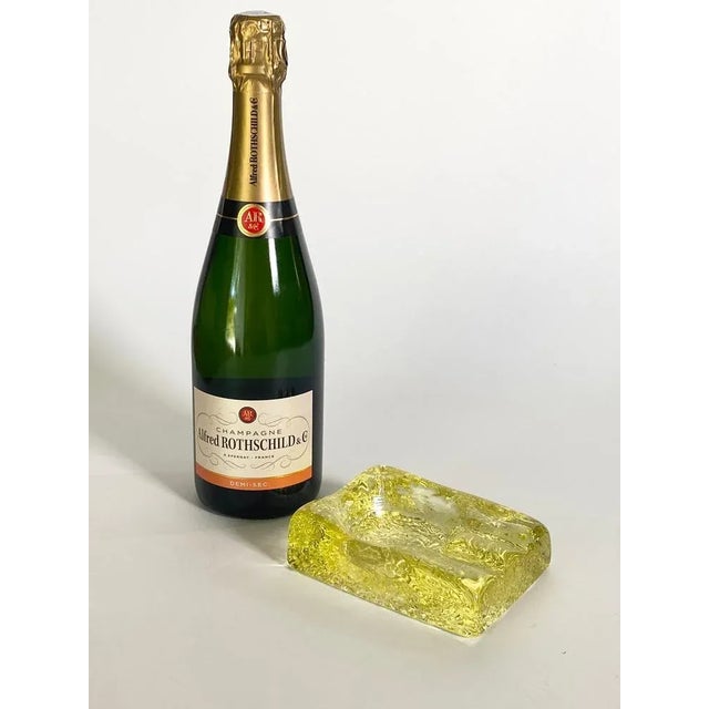 Bubled glass ashtray in a yellow color. Made in France in 1970's. In good condition.