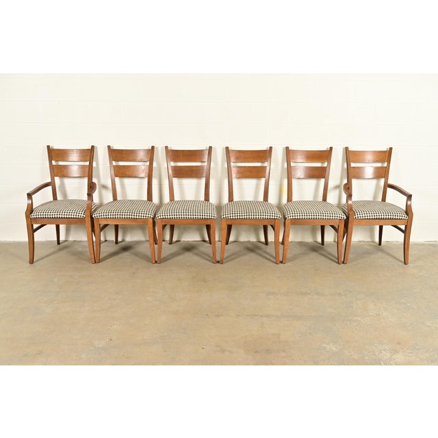 An exceptional set of six Mission or Arts & Crafts style dining chairs By Stickley USA, Circa Late 20th Century Solid oak...