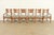 An exceptional set of six Mission or Arts & Crafts style dining chairs By Stickley USA, Circa Late 20th Century Solid oak...