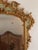A large French green-painted and giltwood mirror having two panels, likely an overmantel mirror, second half 19th century....
