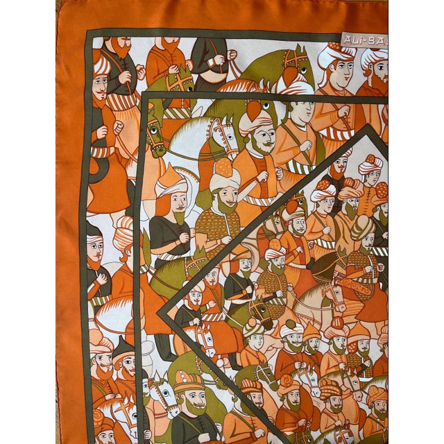 HERMES ALI BABA silk scarf 1972 This scarf depicts an Ottoman cavalry. The headdresses of the bearded figures are all...